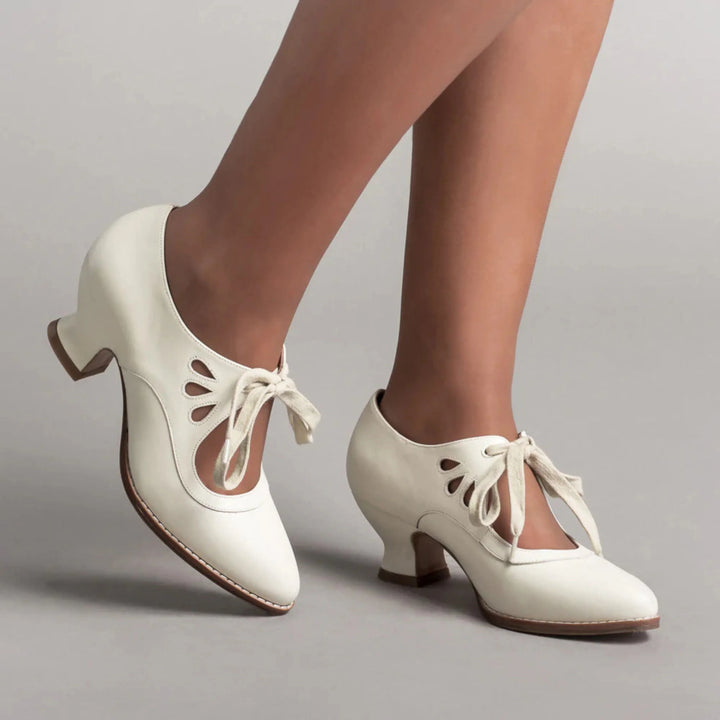 Chaussures Philippine pour femme à talons orthopédiques, semelle intégrée réduisant la pression pour une élégance confortable.