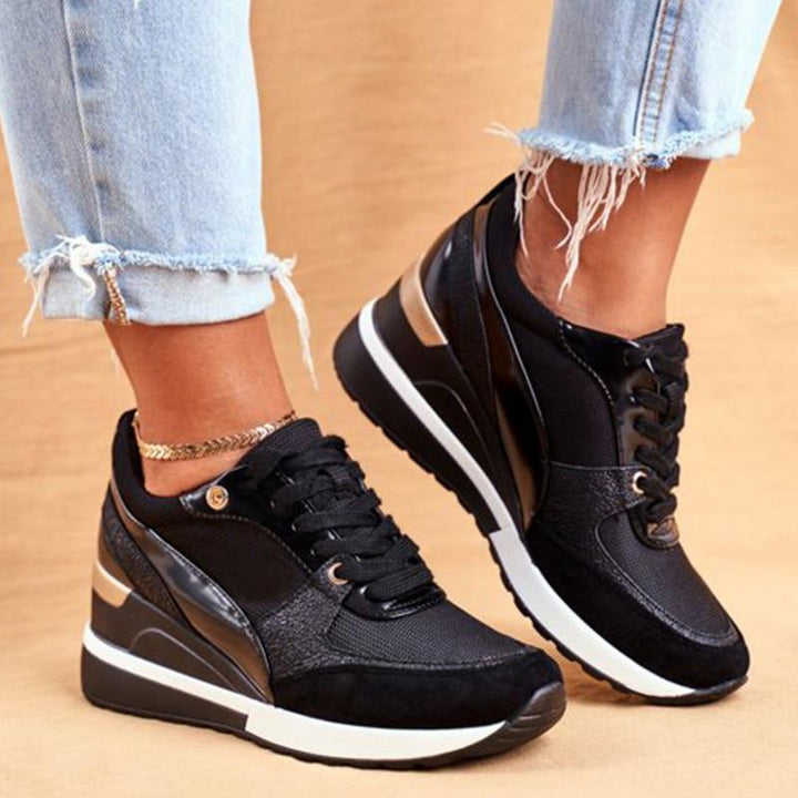 Baskets Octavie pour femme à talons ajustés, finitions raffinées et coupe étudiée pour une allure polyvalente et soignée.