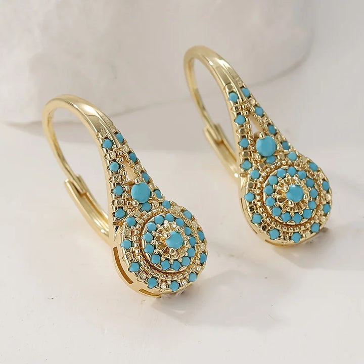 Boucles d’Oreilles Pendantes Dorées avec Turquoise