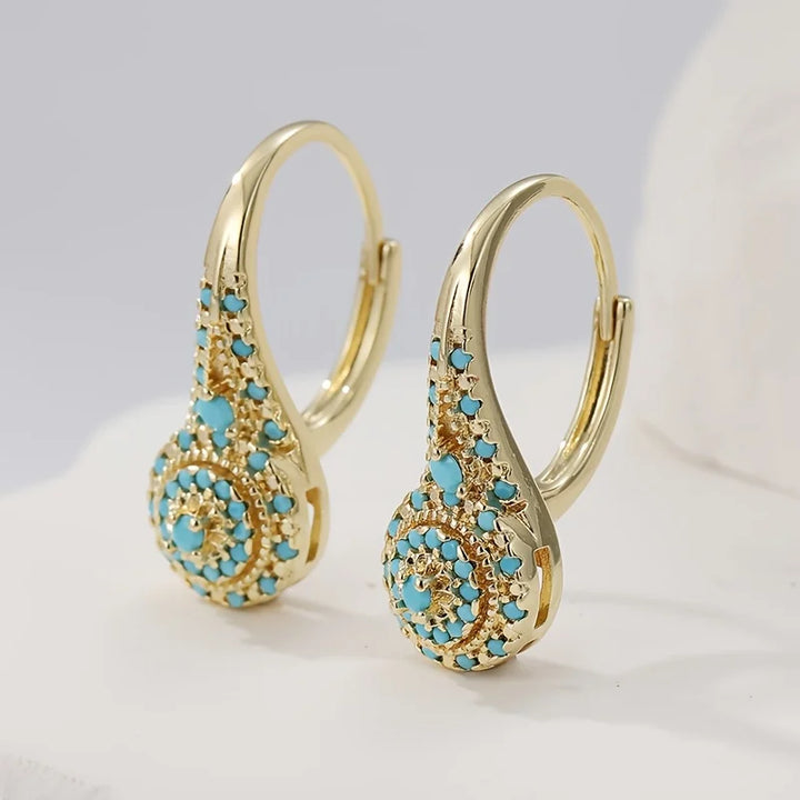 Boucles d’Oreilles Pendantes Dorées avec Turquoise